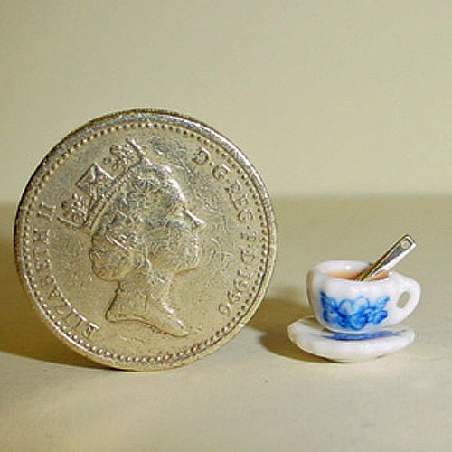 Filled Cup and Saucer With Teasppon