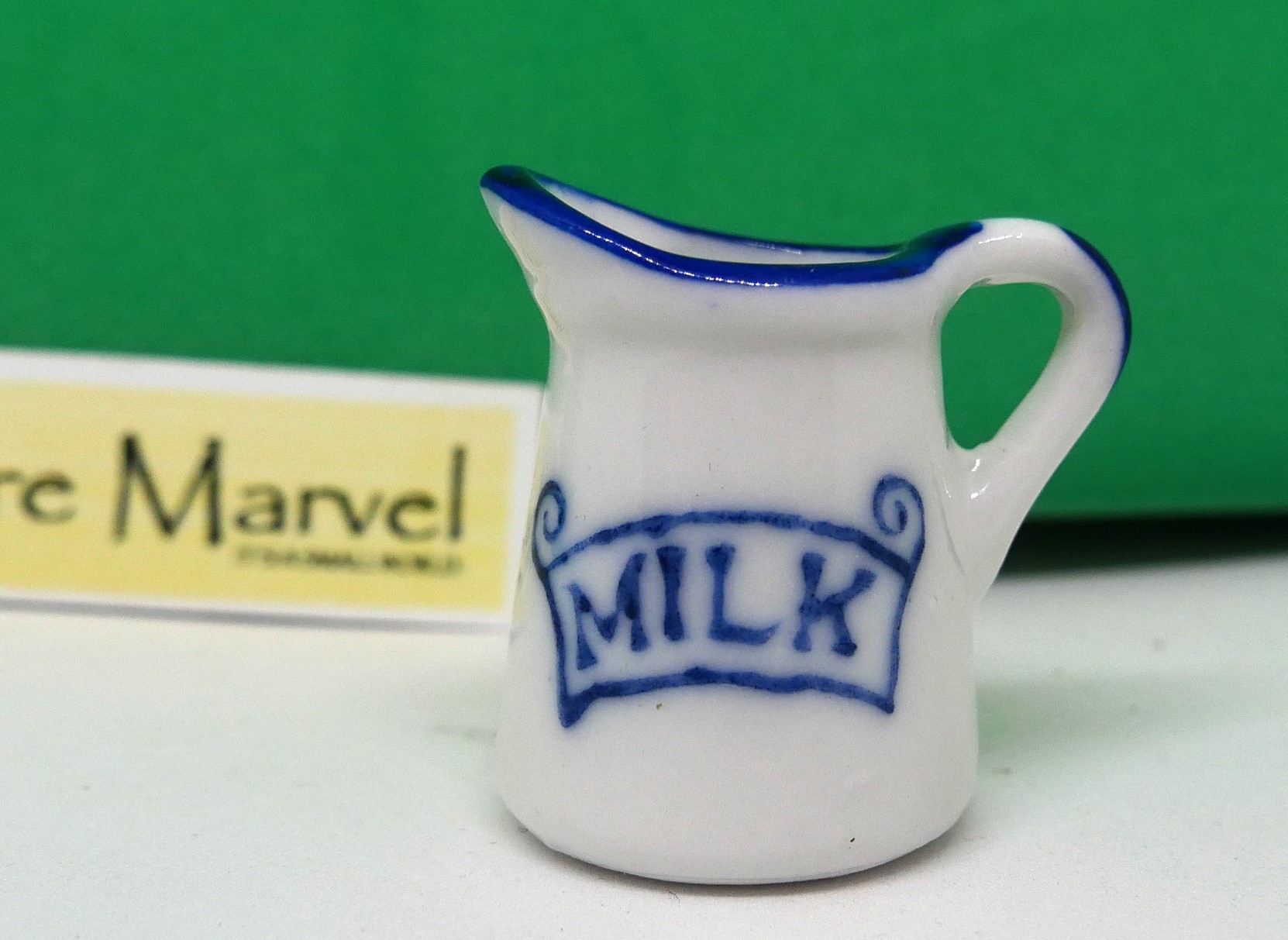 White China Milk Jug with blue trim