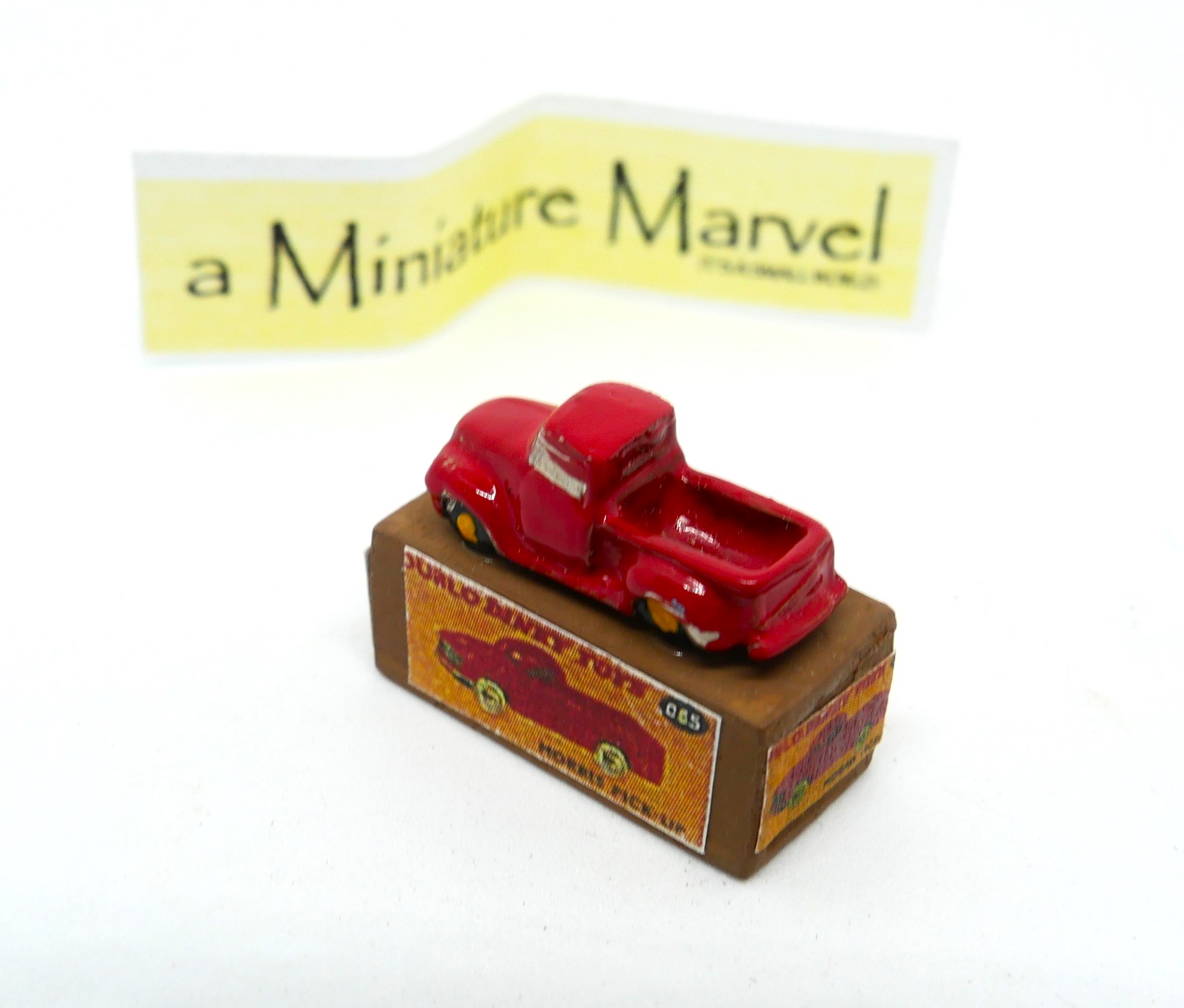 Dinky toy truck on a box