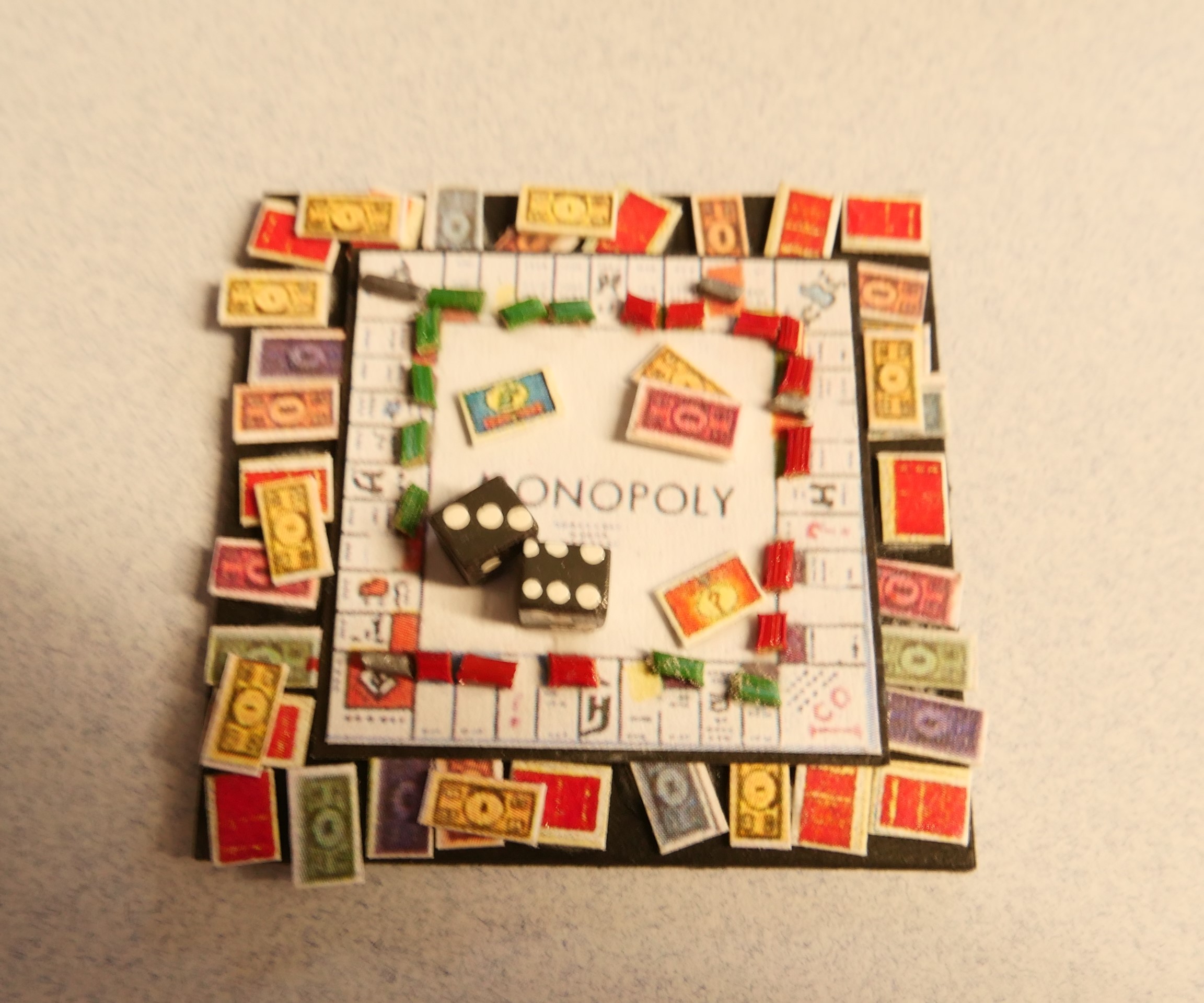 Monopoly game board in play - small