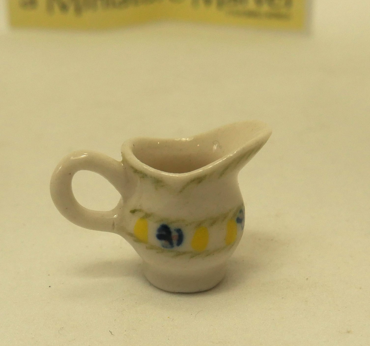 Milk jug yellow blue