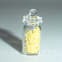 Glass Jar Of Yellow Bath Salts