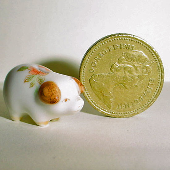 China Piggy Bank in a Brown Floral Pattern.